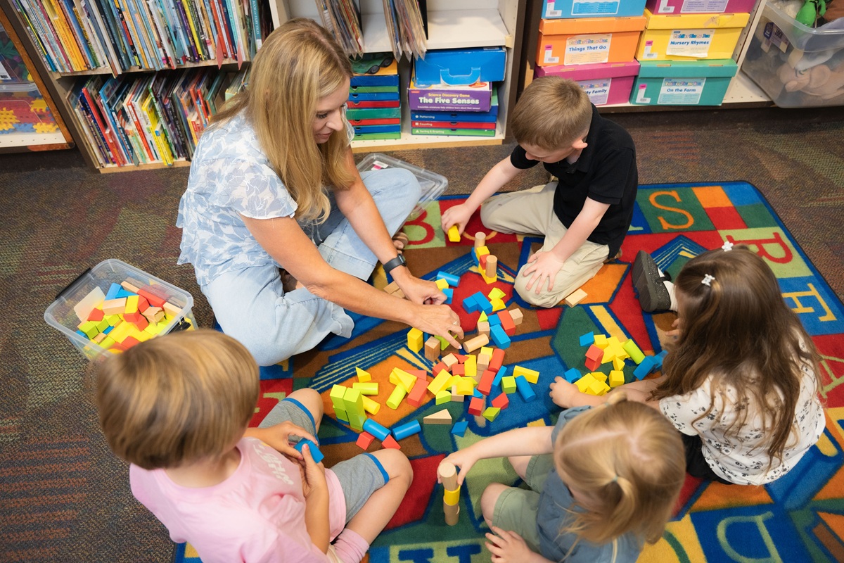 Teacher with children