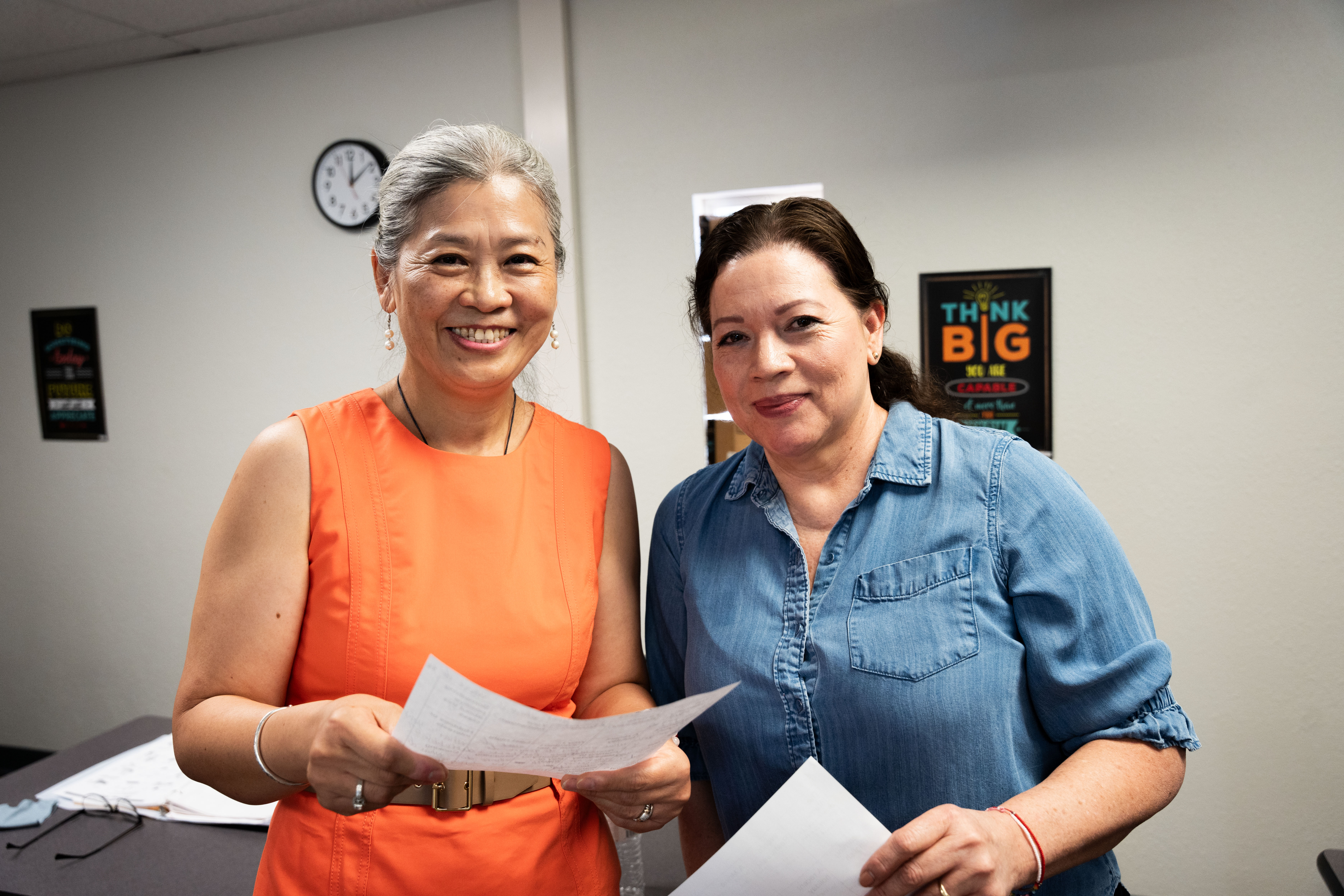 Two English as a second language Students smiling.